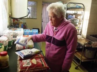 Norma taking stock of the SPAR trolly dash donation